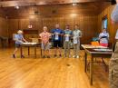 Sprint champions at the awards ceremony (left to right): Ruth Bromer, WB4QZG, Joseph Huberman, K5JGH, Eduard Nasybulin, William Allen, Jonathan Kross, and Lori Huberman [Photo Courtesy of Gheorghe Fala]