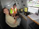 Ryan O'Neill and Brian Short, KC0BS, posing while working PSK31.  [Sterling Coffey, N0SSC, Photo]